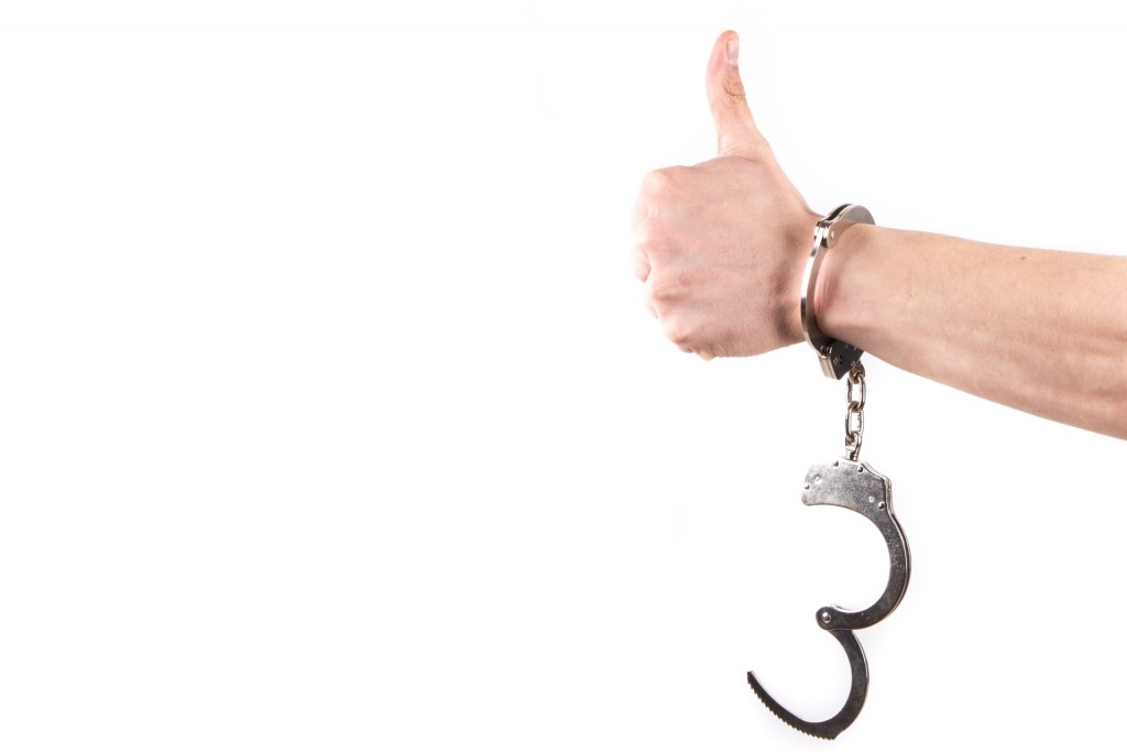 hands-in-handcuffs-1462608921kUa